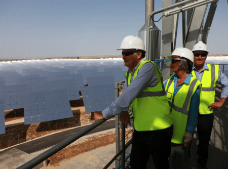 BZE guests Ross Garnaut and Tony Windsor survey the solar field of one of Spain's solar thermal power stations from the tower.
